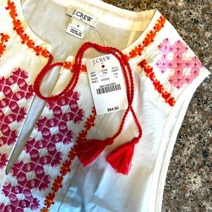 J. Crew sleeveless top with tassels.